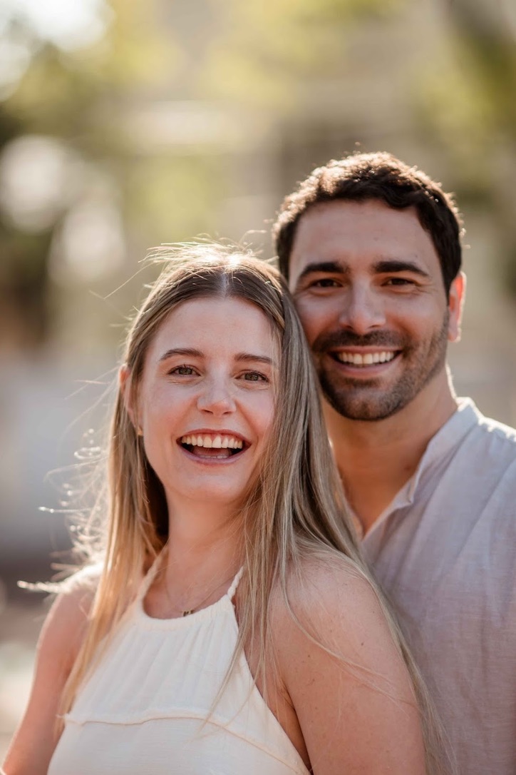 Cami and Jorge smiling together